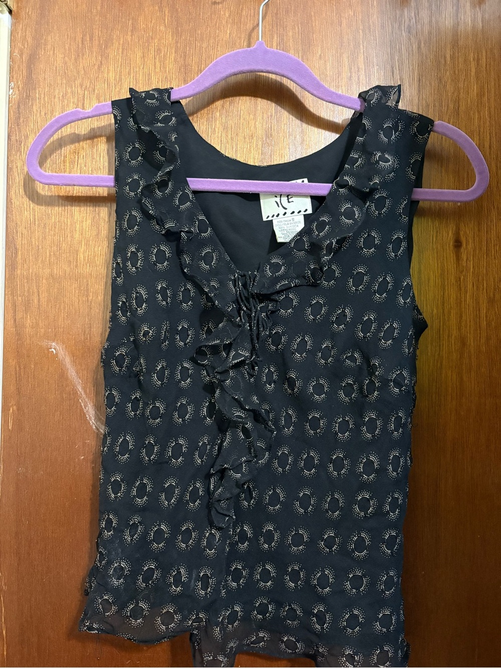 Ruffled Black Sleeveless Sheer Blouse with Metallic Dot